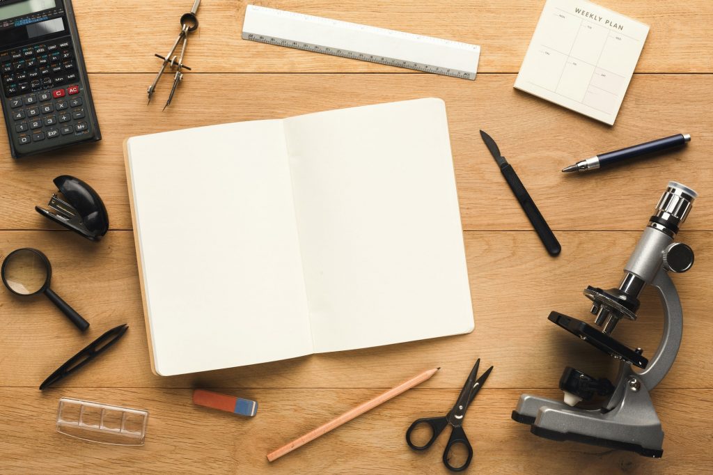 Desktop with various stationery for school education, top view